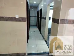 Two-bedroom apartment with a living room for annual rent in Al Majaz 1, Sharjah • 3 bathrooms •