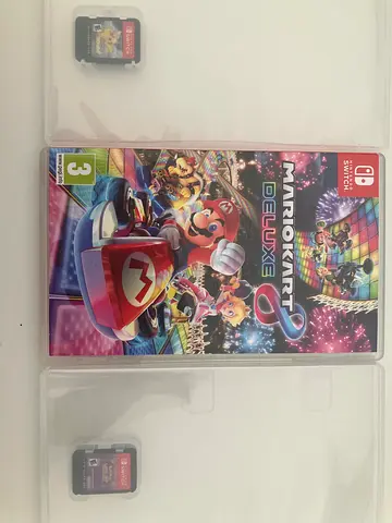 Mario Kart 8 Deluxe, pokemon let’s go pikachu, and pokemon violet