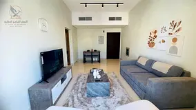 An upscale, fully furnished apartment—brand new and never before occupied—fully equipped and rea