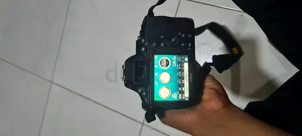 Used Nikon DSLR with strap - good working condition