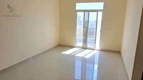 Spacious 1BR apartment for annual rent with 2 bathrooms, balcony, and built-in wardrobes, excellent location, ready to move in now