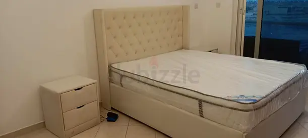 Queen upholstered bed frame