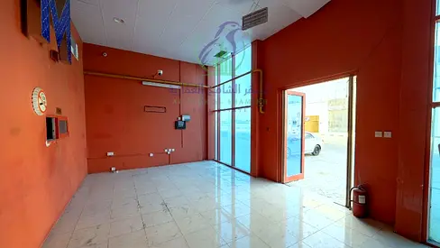 Shop for Rent in Industrial Area 18 on Main Road Glass Front 2500 Sq Ft Mezzanine Fire and Gas System 2 Bathrooms and 3 Rooms
