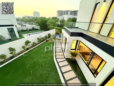 Modern corner villa in Al Zorah featuring 4 master bedrooms, a garden, a swimming pool, and a BBQ area; price includes air conditioning, electricity,