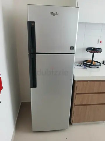Whirlpool two door fridge freezer 55cm width 160cm highest