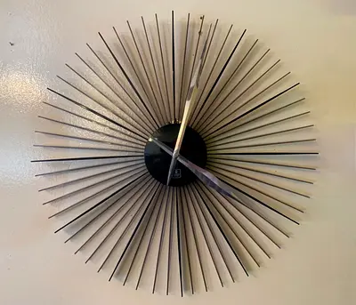 Modern Sunburst Wall Clock – Large Decorative Metal Clock