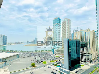 Spacious apartment with Sea view one month Freee easy exited Dubaii MAINTENANCE Freee with 6 Cheques payment opposite of expo Sharjah in al taawun