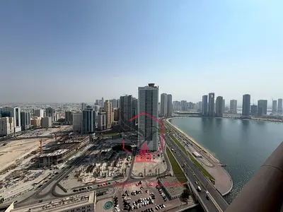 2BR Apartment with Living Room, Sea View, Free A/C, Gym & Pool, Built-in Wardrobes, Spacious Area, Prime Location, Close to All Public Services