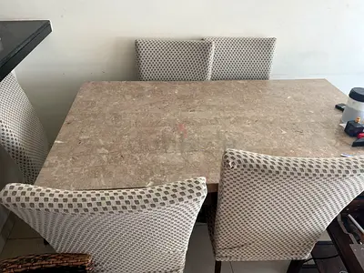 Marble-top dining table with 6 upholstered chairs - good condition