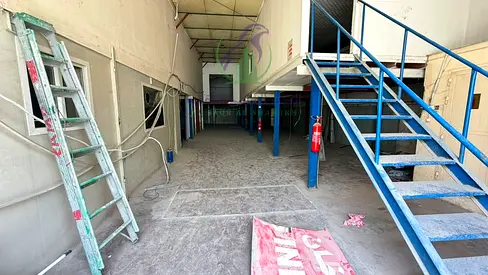 8,000 sqft warehouse for rent in Ind Area 11, Sharjah. Includes mezzanine, offices, 2 baths & high