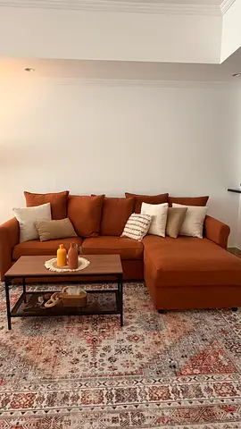 L-shaped brown fabric sofa with chaise and storage - good condition