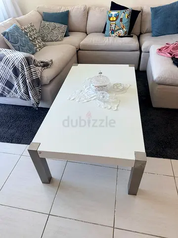 White modern coffee table with metal legs - good condition
