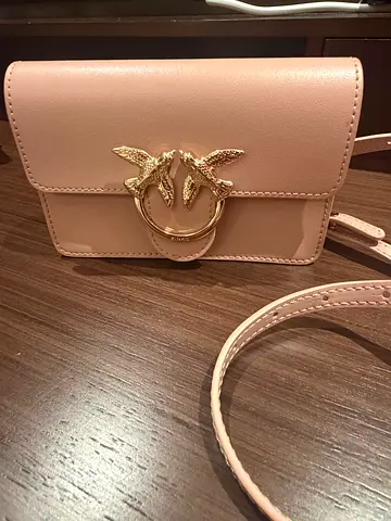 Pinko light pink crossbody bag with gold buckle