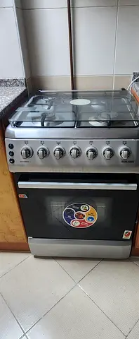 Used 4-Burner Gas Cooker with Oven - Stainless Steel, Good Working Condition