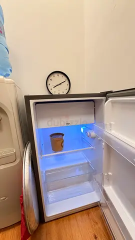 Compact single-door mini fridge in good working condition with warranty