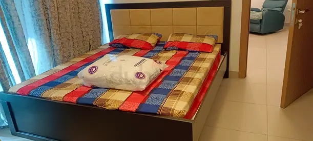 Queen size wooden bed frame with padded headboard - good condition
