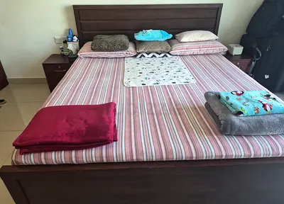King size (180×200) wooden bed frame with 2 storage drawers and 2 side tables - good condition