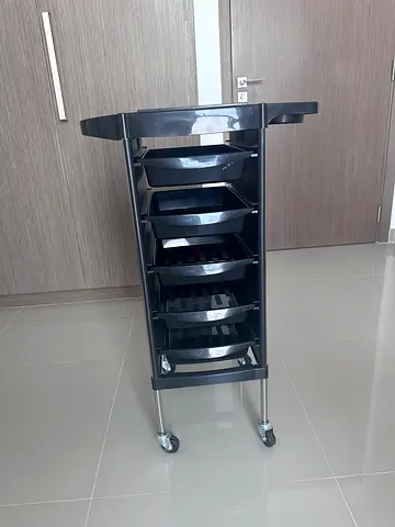 Mobile salon trolley with multiple drawers and wheels — good condition
