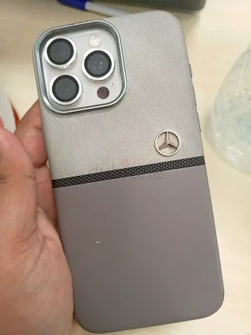 iPhone 15 pro max white colour with protective Mercedes-style case - good condition