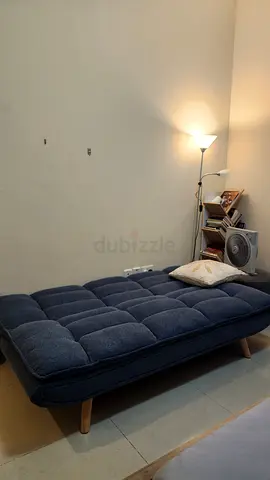 Navy Blue Tufted Sofa Bed with Wooden Legs