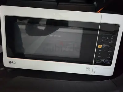 LG microwave oven - countertop, good working condition.