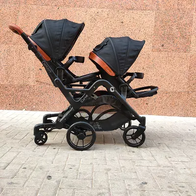 Contour curve twin stroller