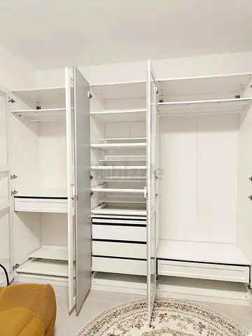 White Built-in Wardrobe with Shelves, Drawers and Hanging Space - Good Condition