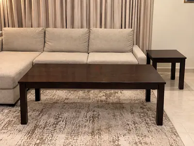 Solid wood dark brown coffee table and matching side table - good condition