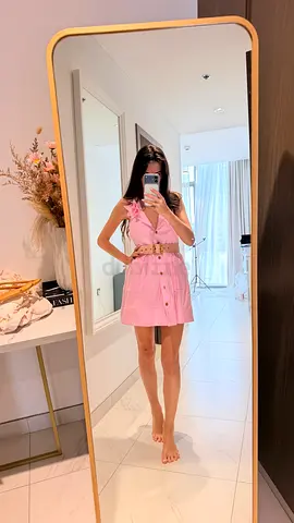 Beautiful pink mini dress with an open back