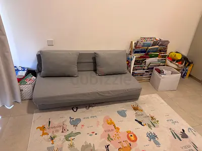 Grey convertible sofa bed with cushions - Excellent condition and Price