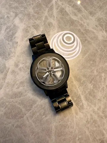 1 of 100 Black with Gyro wheel men's wristwatch with metal bracelet