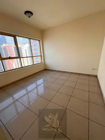 A spacious 2-bedroom apartment with a living room available for annual rent in Al Khan, located directly on the Corniche, with a prime location and an