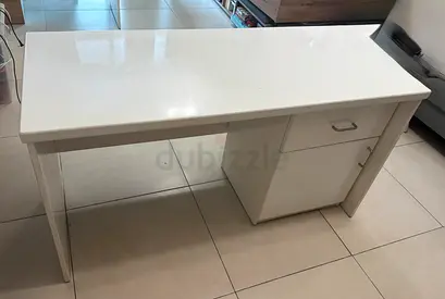 White office desk with drawer and cabinet - good condition. It’s a custom made strong solid table.