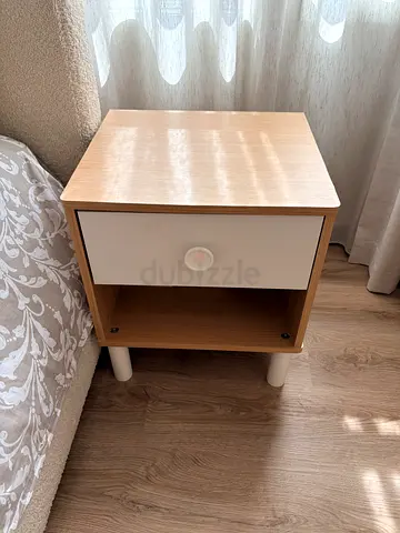 Light wood bedside table with drawer