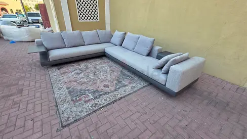 Selling high quality Italian Lsahpe sofa like brand new condition