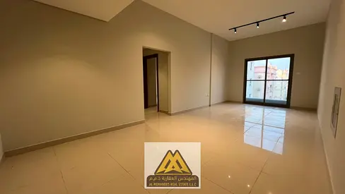A brand-new first-occupancy 1-bedroom apartment is available for annual rent in Al Nuaimiya, Ajman