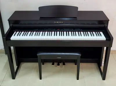 The Yamaha Clavinova CLP-430R (Rosewood finish) is an 88-key digital piano featuring Graded Hammer