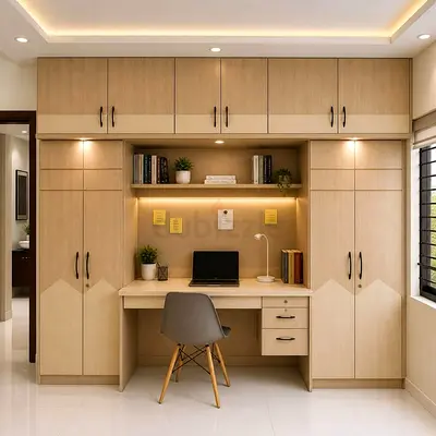 Custom built-in bedroom wardrobe with integrated study desk and storage — light wood finish