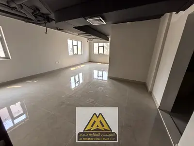 A well-located office is available for annual rent in Al Rawda 2, Ajman, near Sheikh Ammar Street. The office has an area of 58 square meters, equival