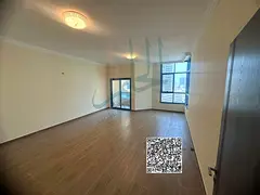 Two-bedroom apartment with a living room in Al Khor Towers for annual rent.