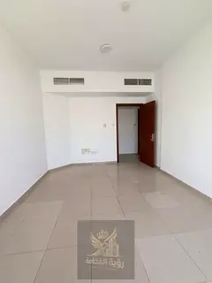 One month free; excellent view overlooking Al-Wahda Street; includes a balcony, two bedrooms, a livi