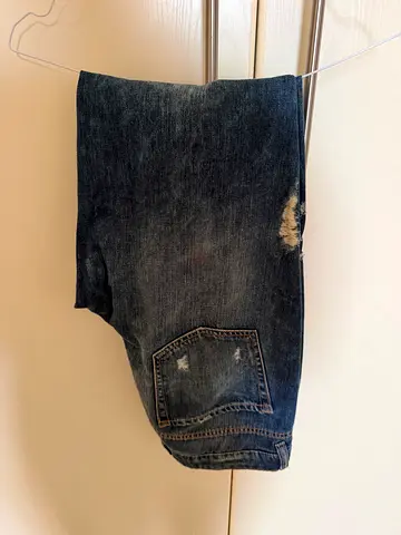 Women’s dark blue distressed jeans, size7 — gently used