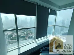 Free air conditioning and free parking | Office for annual rent in Al Majaz 2 - Sharjah | Sea view |