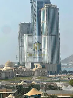 Wonderful apartment for rent in Al Mamzar, featuring a room, a living area, a kitchen, and a bathroo
