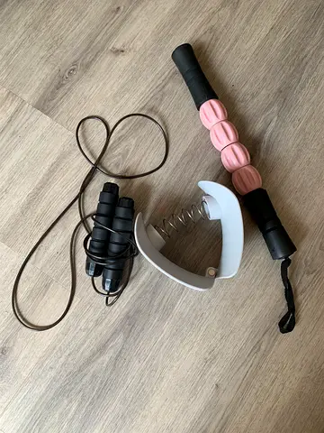Used jump rope, hand grip strengthener and massage stick - light use