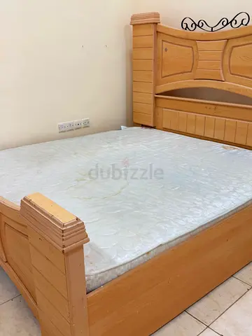Solid Wood Double Bed with Headboard and Storage Shelf - Good Condition