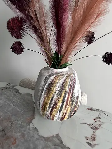 Decorative ceramic vase with dried pampas arrangement