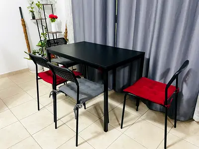 IKEA Dinning Table with 4 chairs - AED130