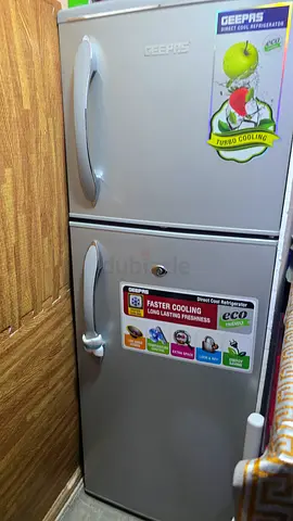 Compact double-door refrigerator in good working condition
