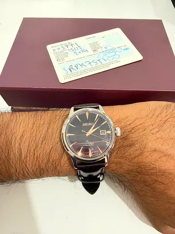 Seiko Presage automatic dress watch with black dial and leather strap